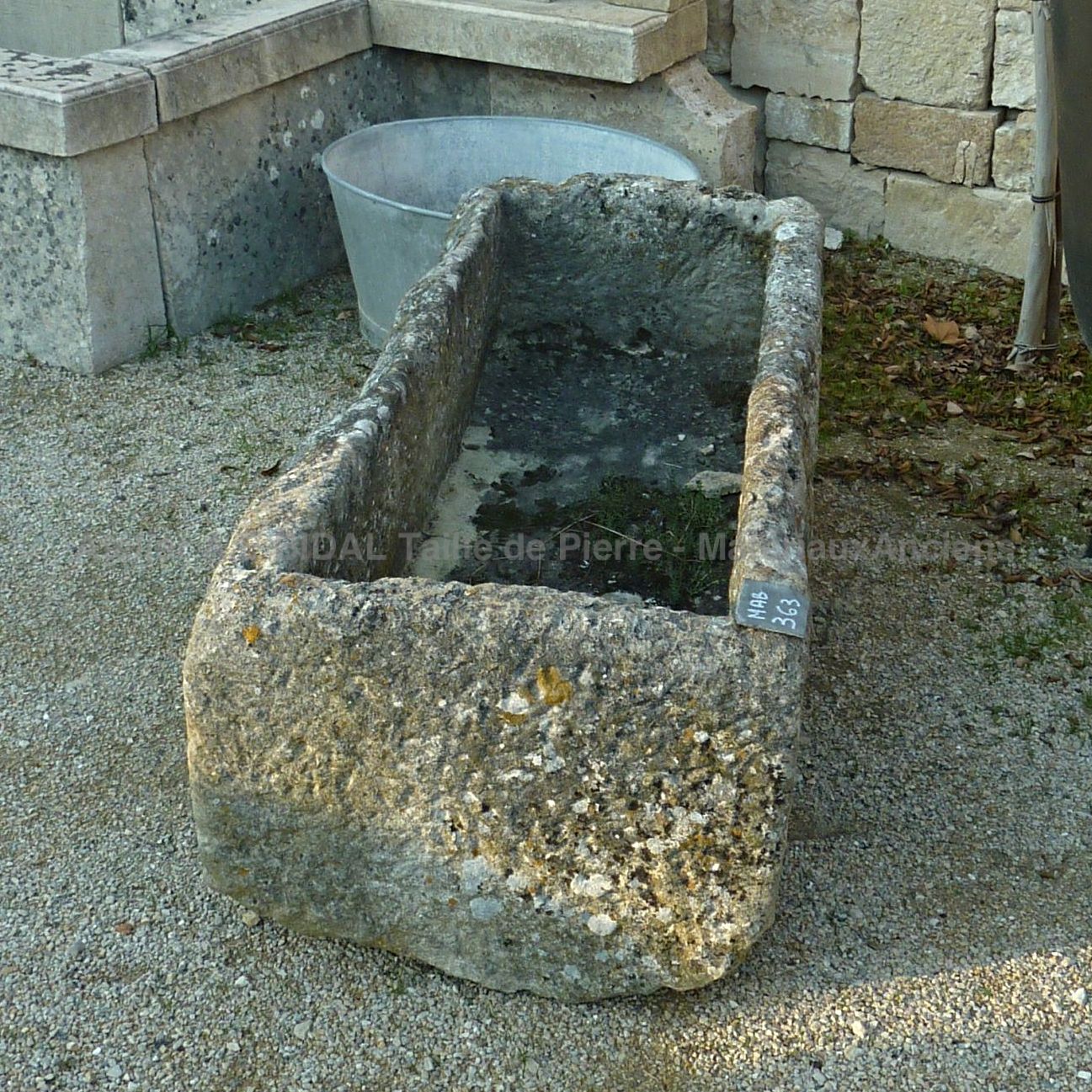 Long antique rectangular stone trough with a rustic appearance ** SOLD