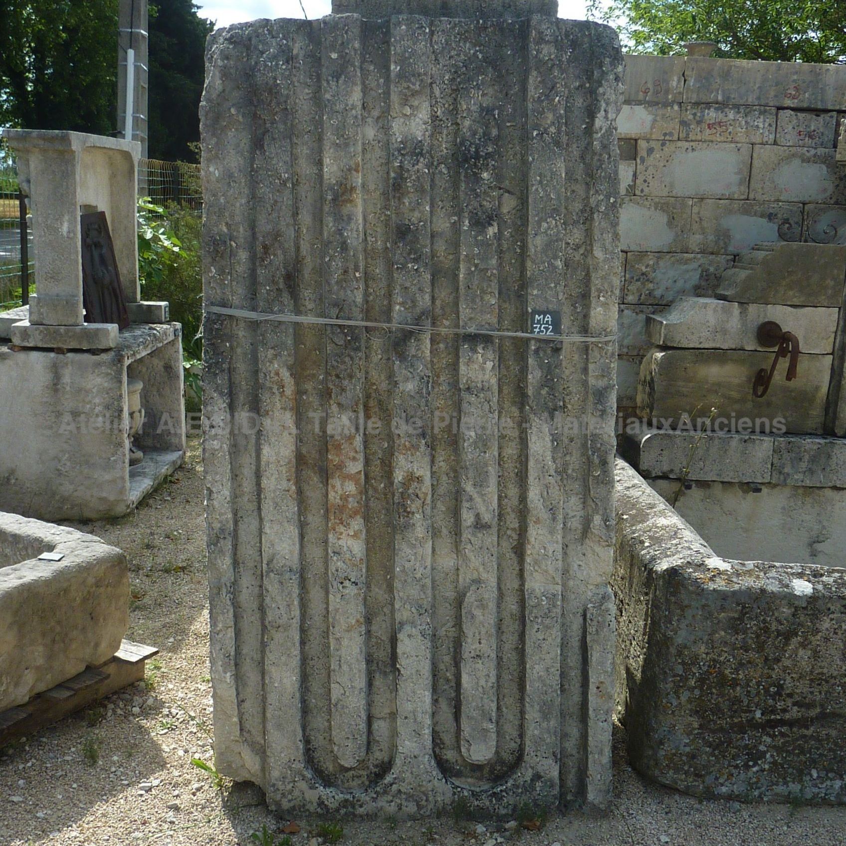 Pair of natural stone water coolers.