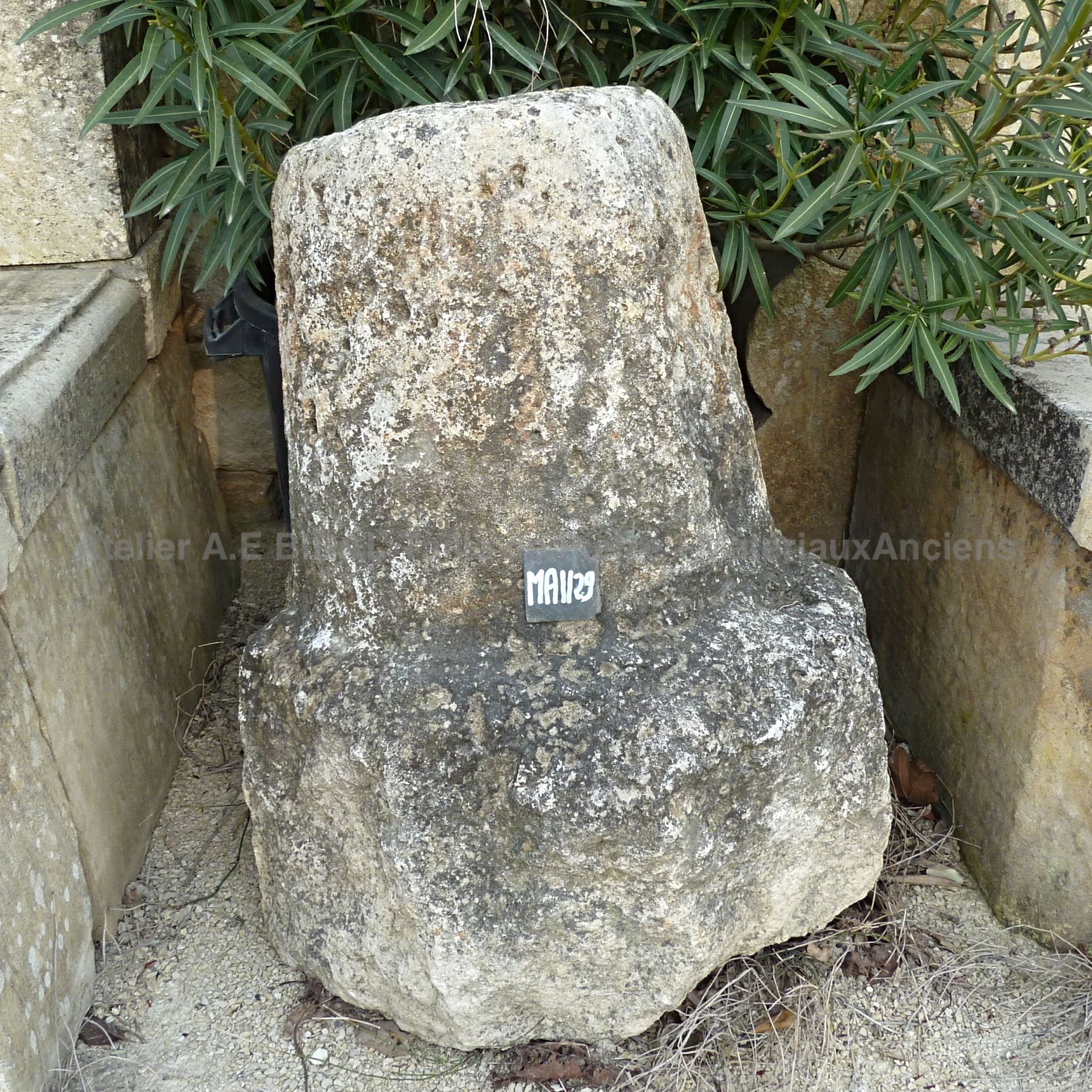 Old mile marker that is one of a kind - rustic stone marker.