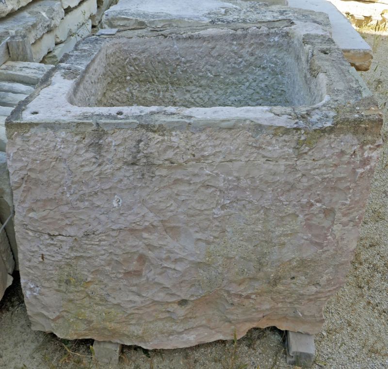 Antique trough in stone ideal for a rustic and robust planter on sale at Alain BIDAL Antique Materials in Provence.