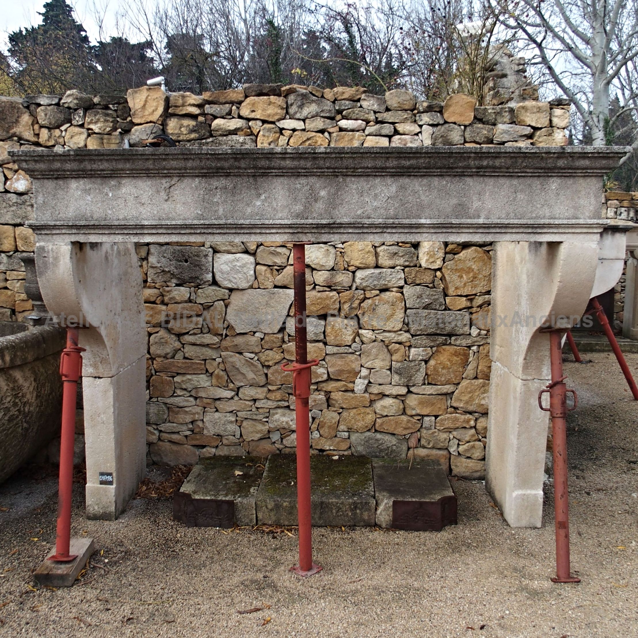 Louis 14 fireplace - large stone fireplace.