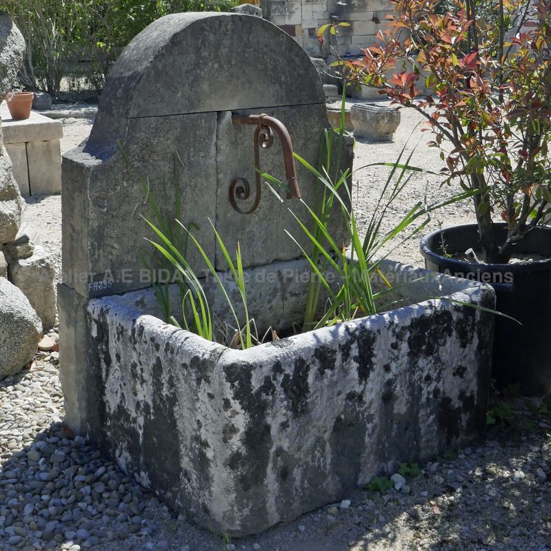 Small stone fountain for charming outdoor water point | Wall fountain for small garden or terrace for sale at low price !
