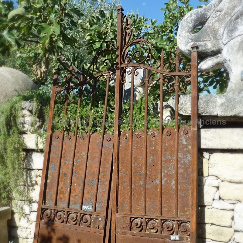 Antique wrought iron gate - wrought iron patinated by time which leaves a nice natural patina on the surface of these 2 old gates.