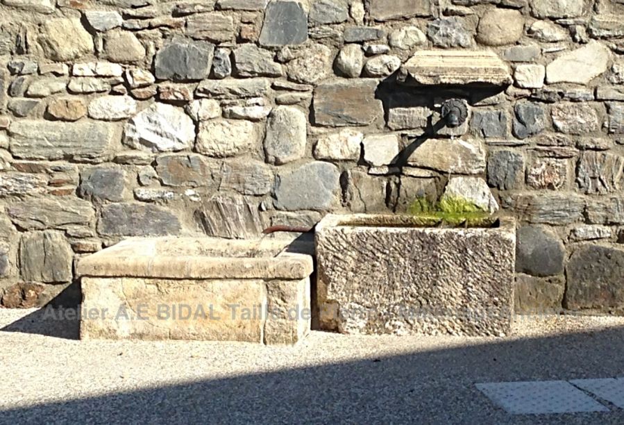 Superb garden fountain signed AE Bidal made of antique stones..