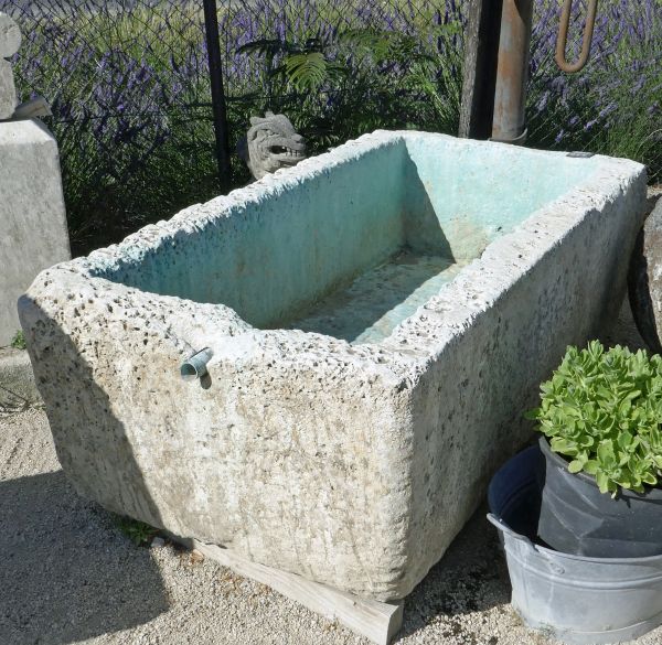Large antique stone trough with a nice rustic design for sale at Alain BIDAL Antique Materials in Provence.
