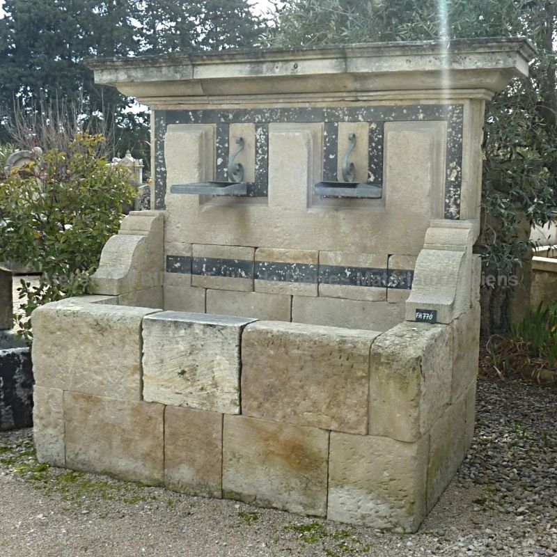 Beautiful large fountain in stone and antique materials | Wall fountain with exceptional decorative rendering.