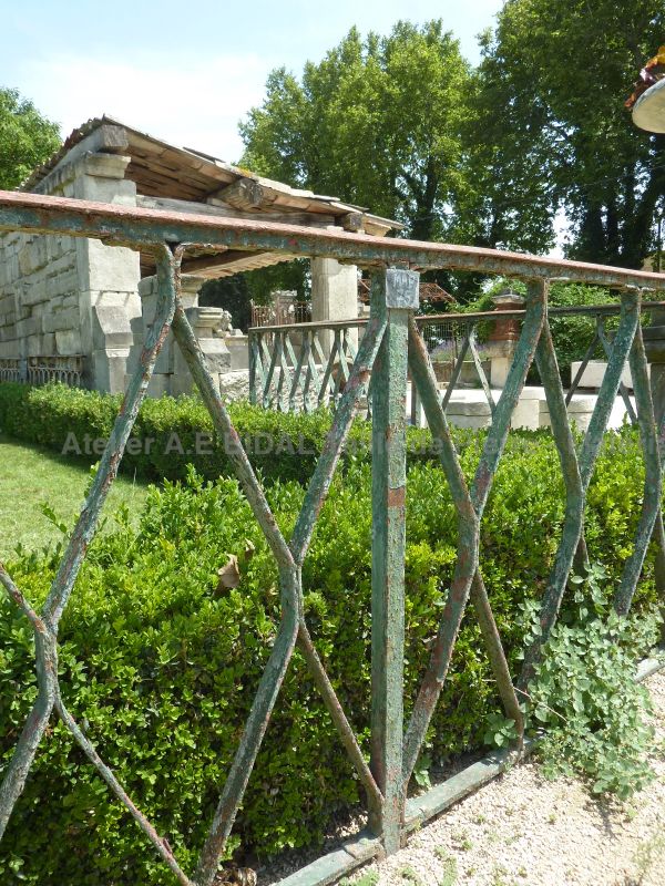 Old parapet with twisted bars - old parapet made of wrought iron.
