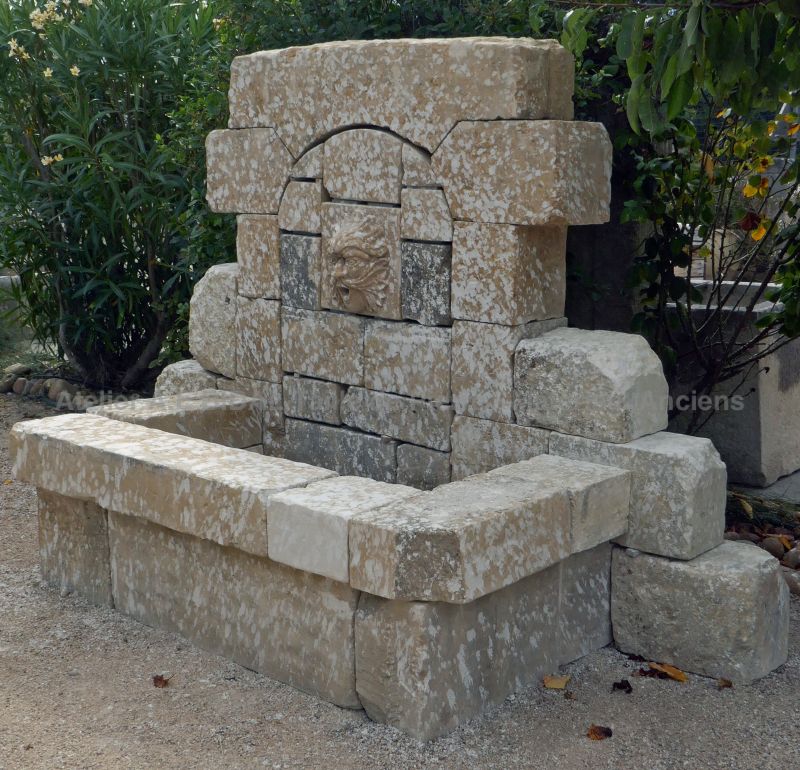 Outdoor decorative fountain in old stones : stone fountain by Atelier Alain BIDAL