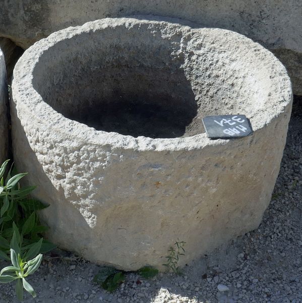 Small antique round trough in stone - Shallow stone trough ideal as a rusticly charming planter.