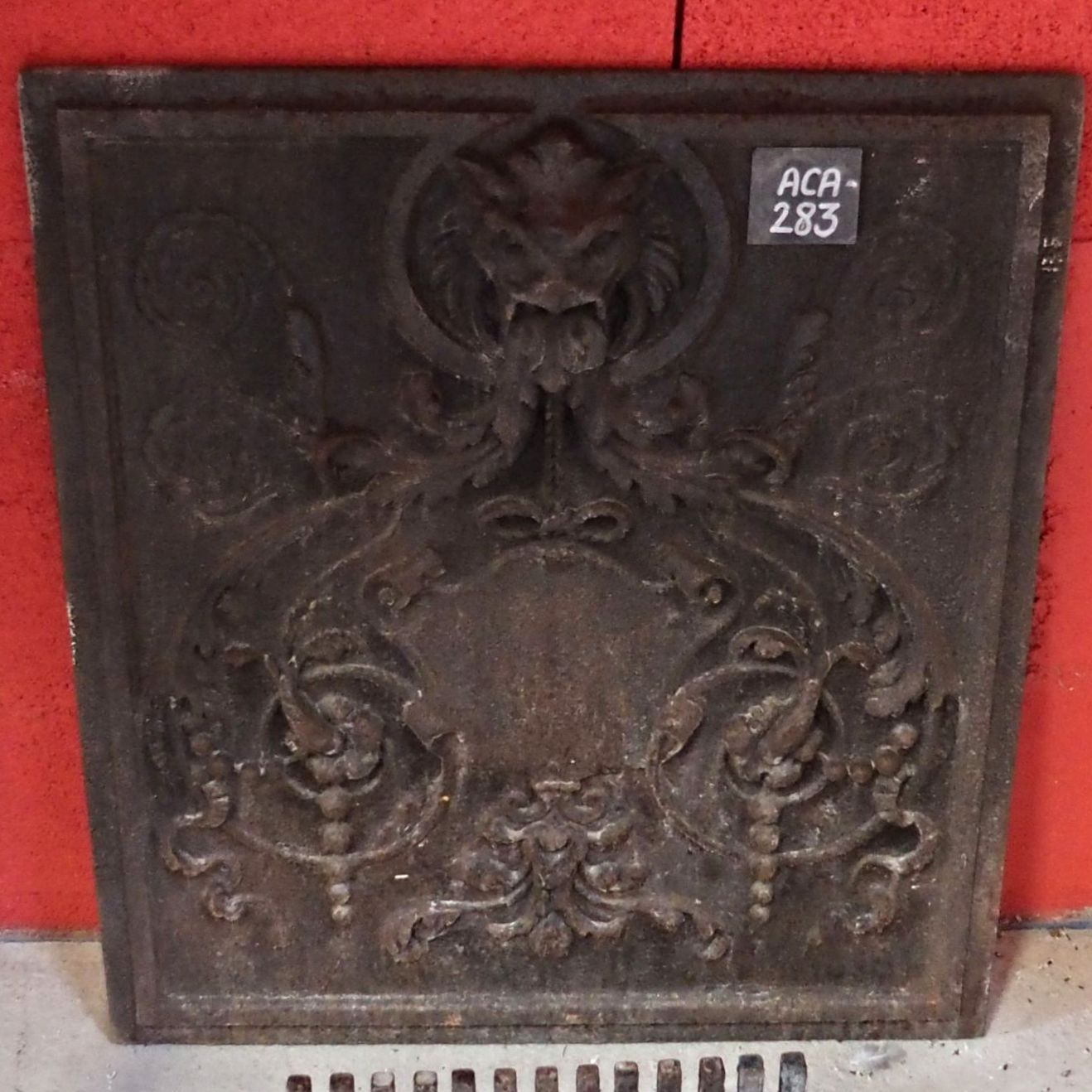 Beautiful cast iron fireback - old cast iron fireplace accessories.