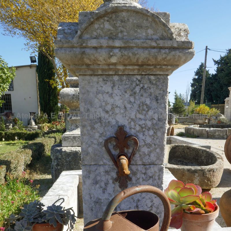 Detail of the column on our central fountain with sculpted capital and stone ball