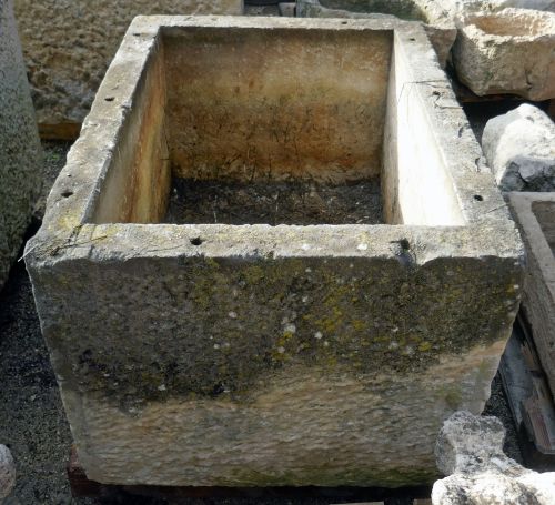 Antique trough in old patinated stone for sale at Alain Bidal Antique Materials in Provence