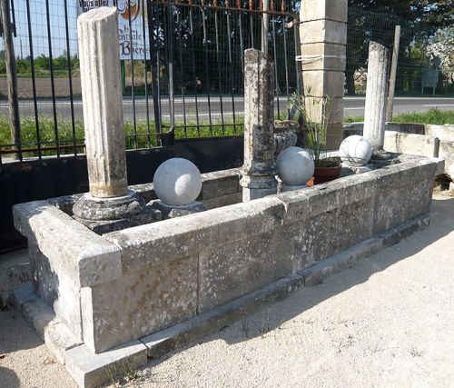Beautiful stone garden with pediment that can be transformed into outdoor fountain with basin.