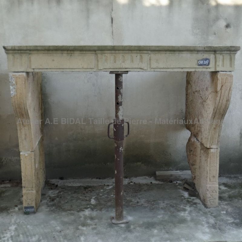 Stone fireplace carved in a hard Bourgogne limestone - Rustic looking Louis XVI mantle