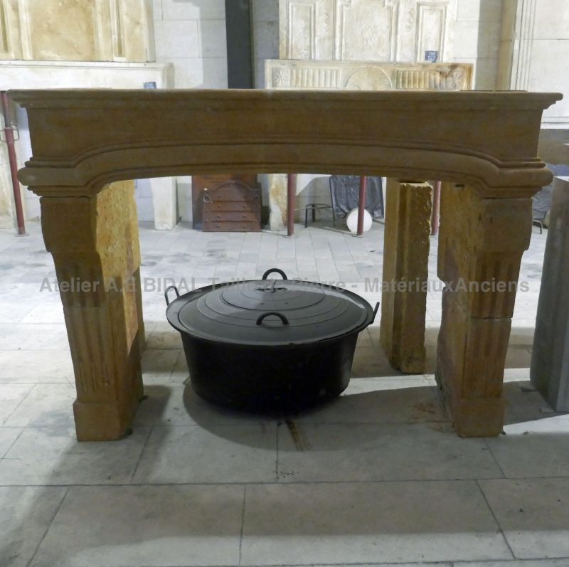 Antique 19th century fireplace in golden natural stone for sale from a wide selection at Alain BIDAL (Provence)