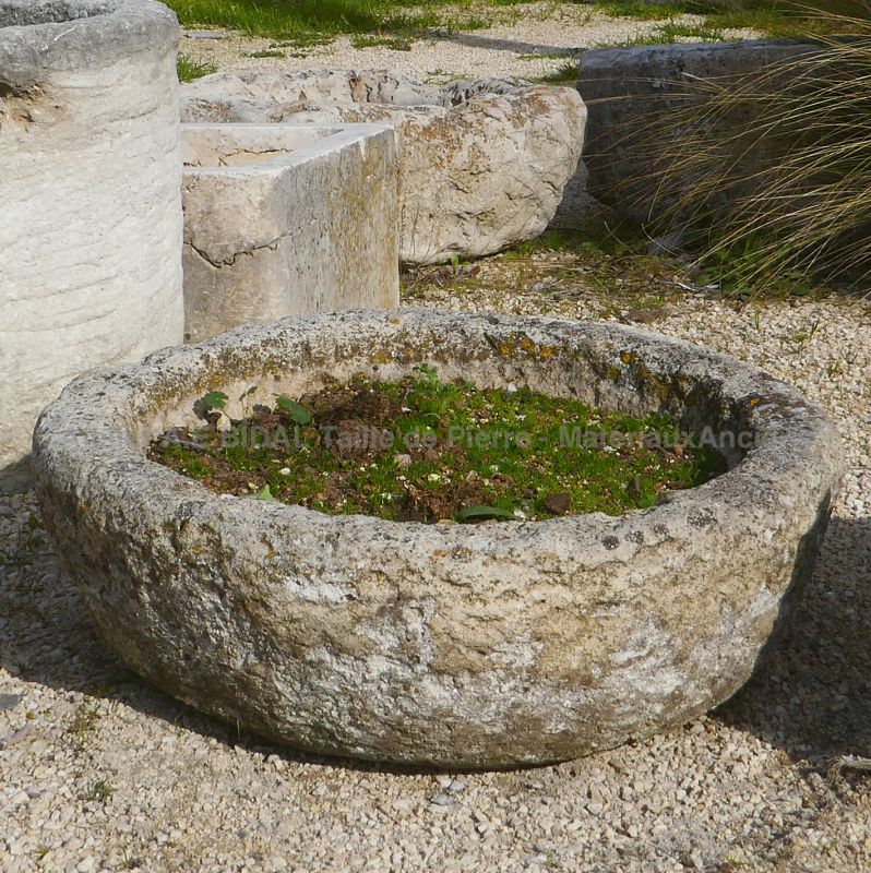 Old shallow round stone trough by Alain BIDAL Antique Materials in Provence