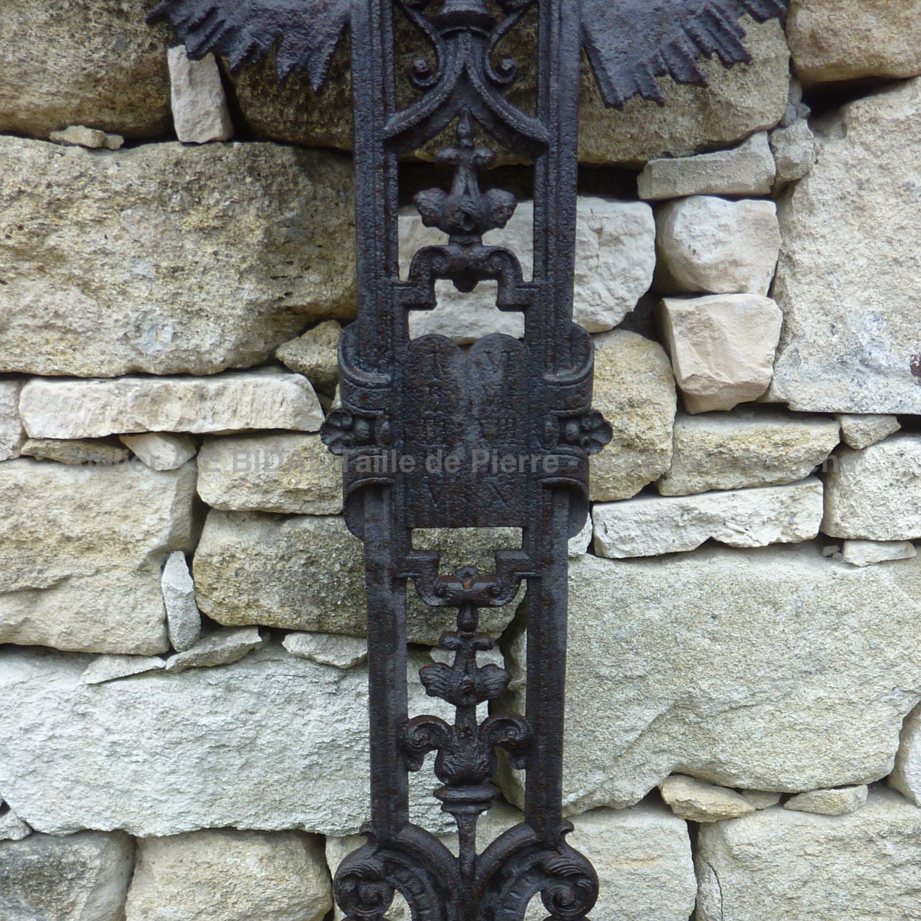 Beautiful old cross decorated with elements of nature and religious elements - old cross of exceptional beauty.