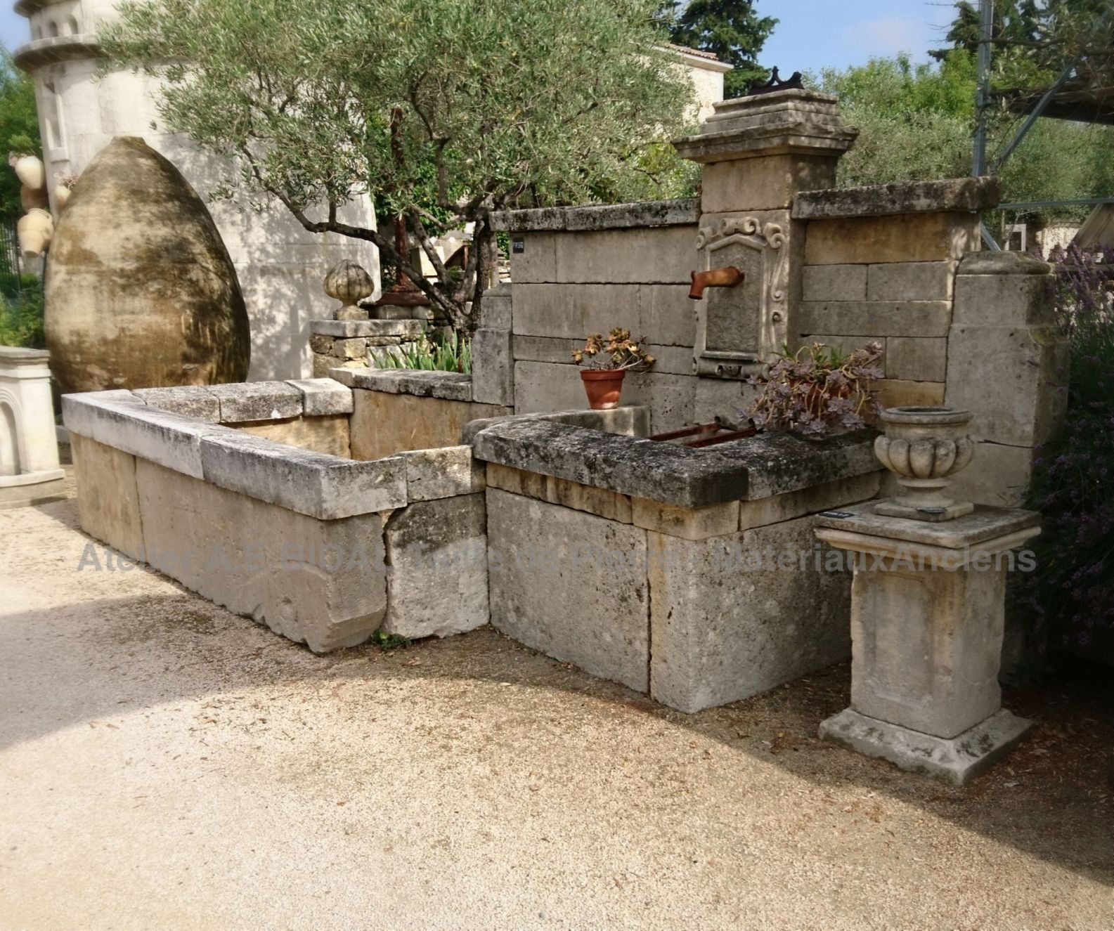 Large outdoor fountain in stone | Garden fountain with double basins in old stones.