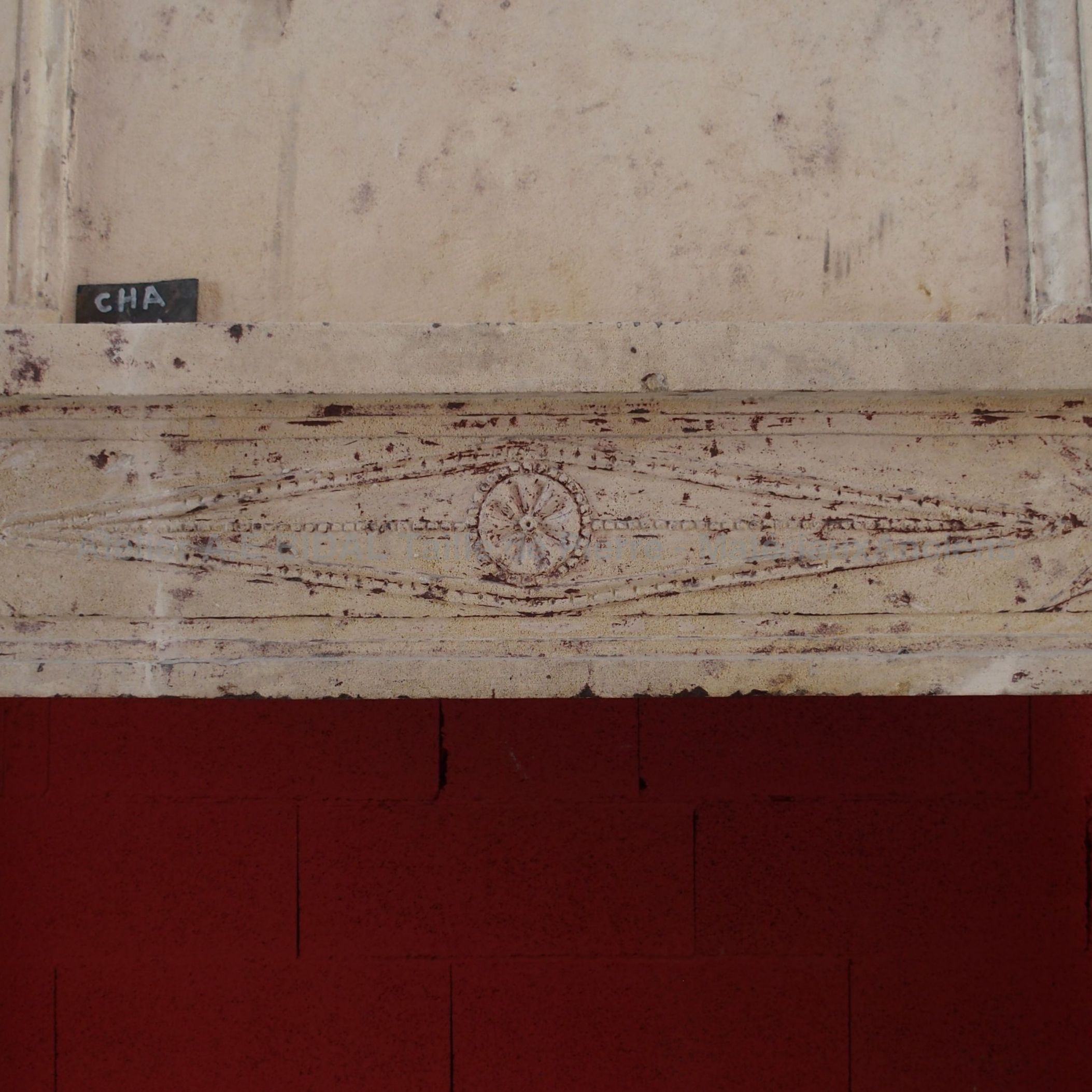 Beautiful old fireplace in our fleet of Louis XVI period fireplaces.