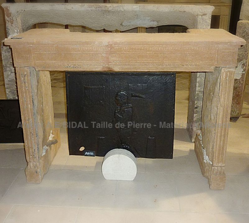 Antique fireplace made of a naturally golden gold authentic stone.
