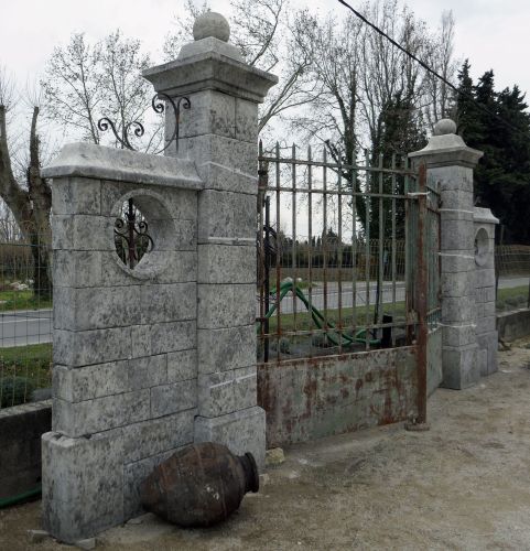 Pair of old stone pillars for sale at Alain BIDAL Antique Materials in Provence.