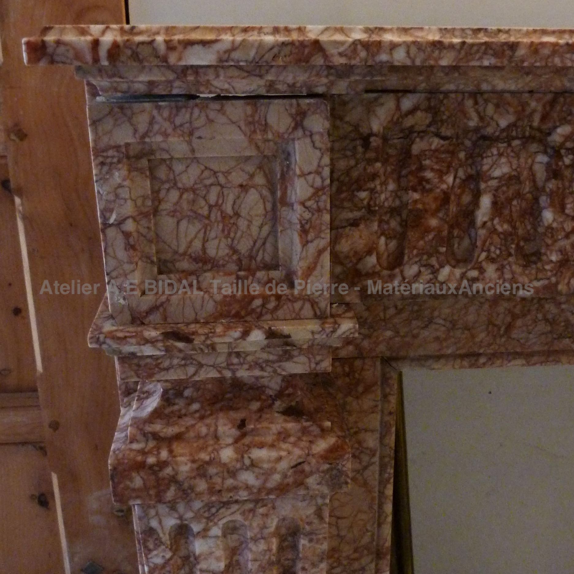 Beautiful old fireplace: pink marble fireplace from the 19th century.