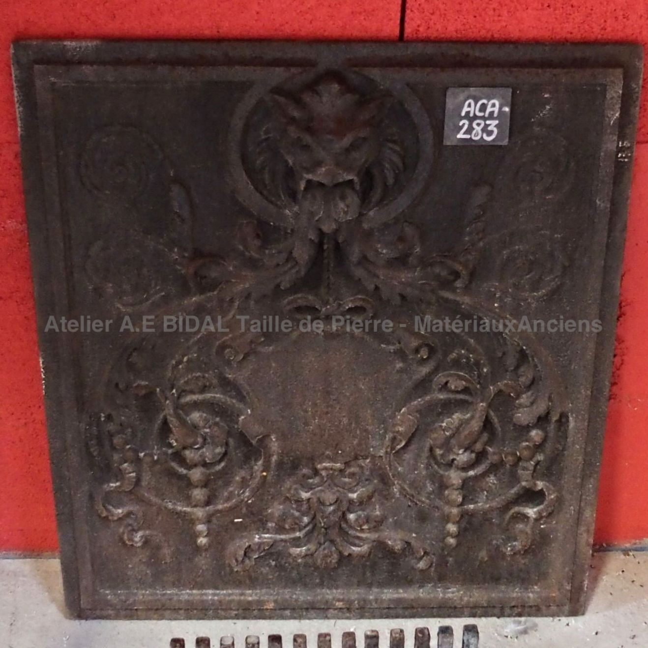 Beautiful cast iron fireback - old cast iron fireplace accessories.