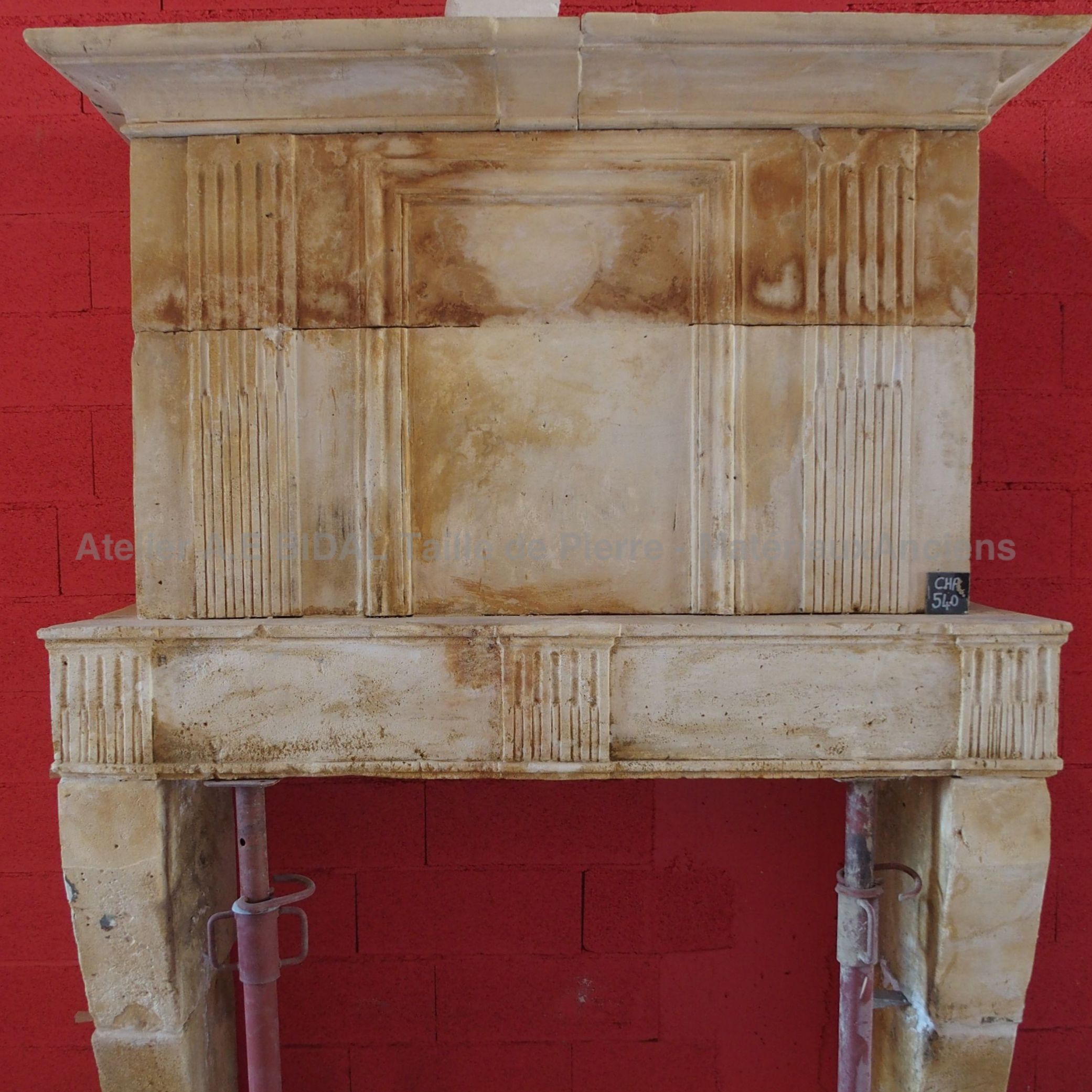 Old fireplace: an old stone fireplace perfect for an indoor use.