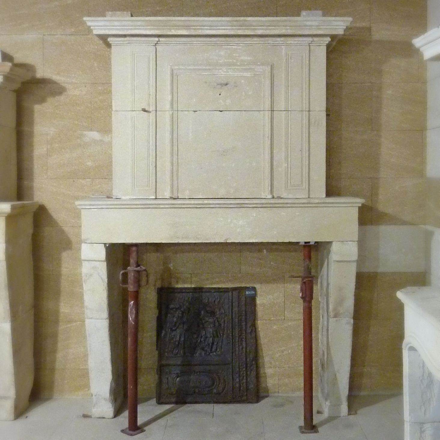 Fireplaces in stone of period and style Louis XVI at Alain Bidal - Provence.