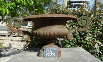 Old vase - old vase with two handles made of old cast iron.
