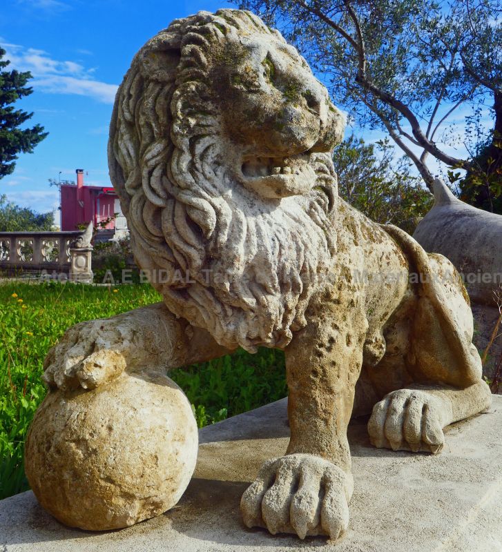 Antique lion statue on molded base - 18th Century lion in stone - Atelier Alain BIDAL (Provence)