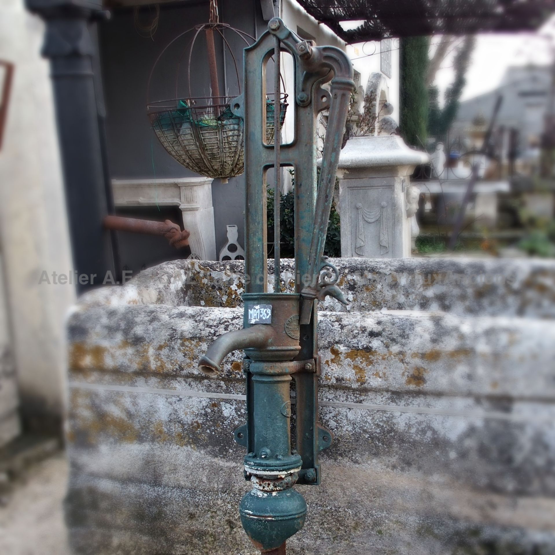 Beautiful large hand pump - beautiful old type of water pump.
