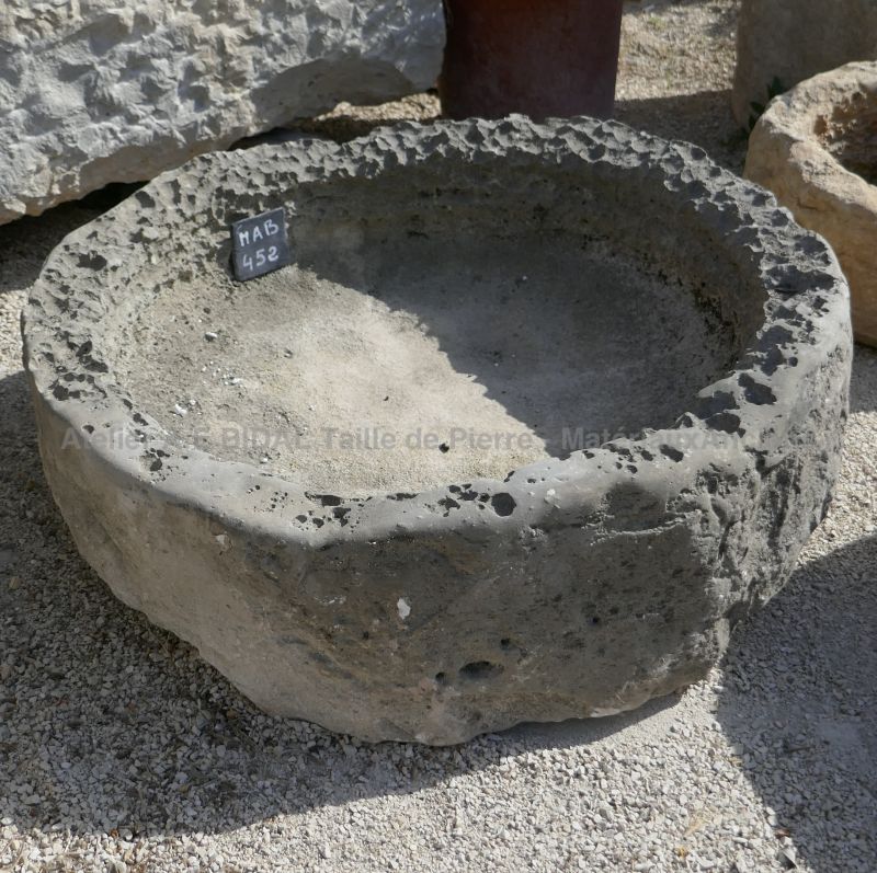 Circular trough in stone by the Antique Materials in Provence Alain BIDAL