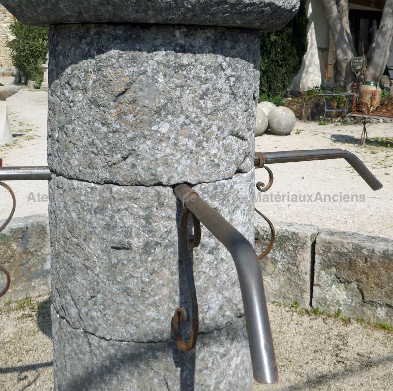 Detail of the wrought iron waterspouts on our central column in stone : Atelier Alain BIDAL