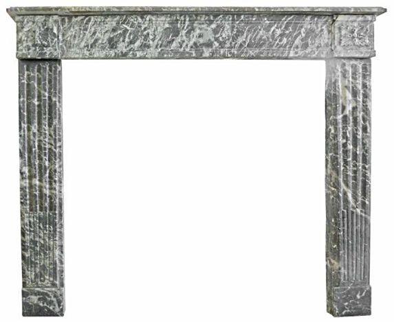 Cheminée marbre gris veiné de blanc - cheminée Louis 16 à rosaces.
