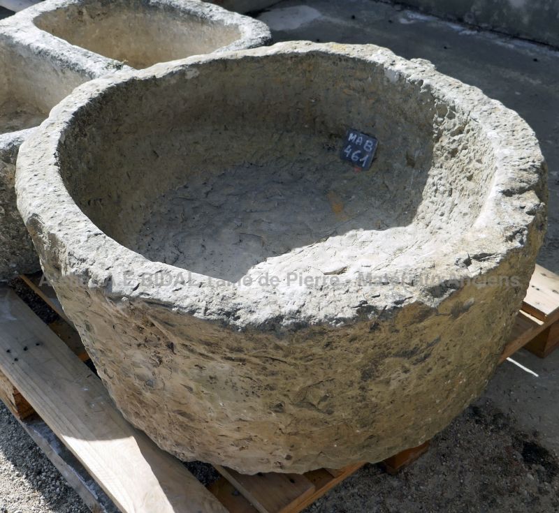 Large antique circular shallow stone trough for sale at Alain BIDAL Antique Materials in Provence.