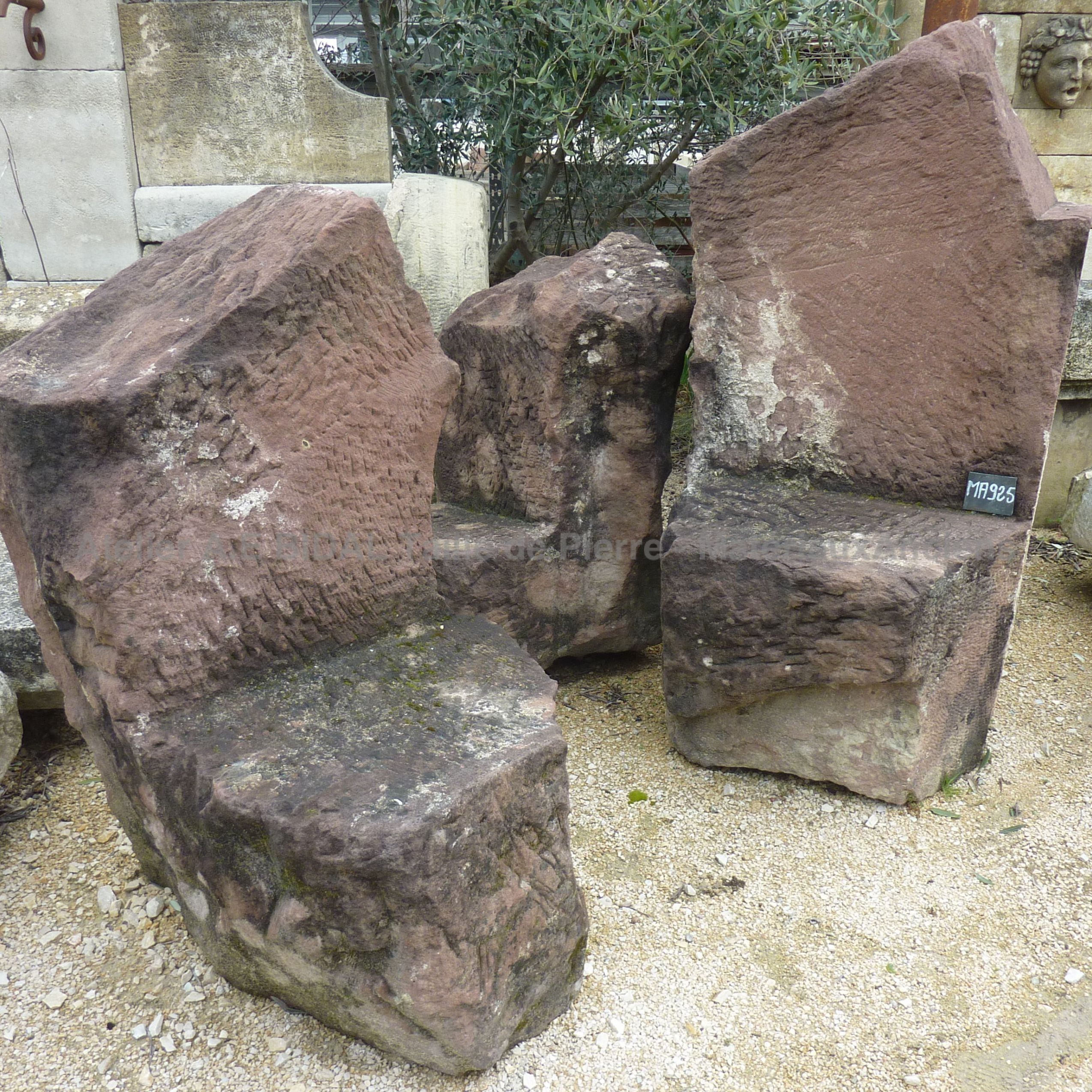 Antique garden furniture - rustic pink sandstone armchair.
