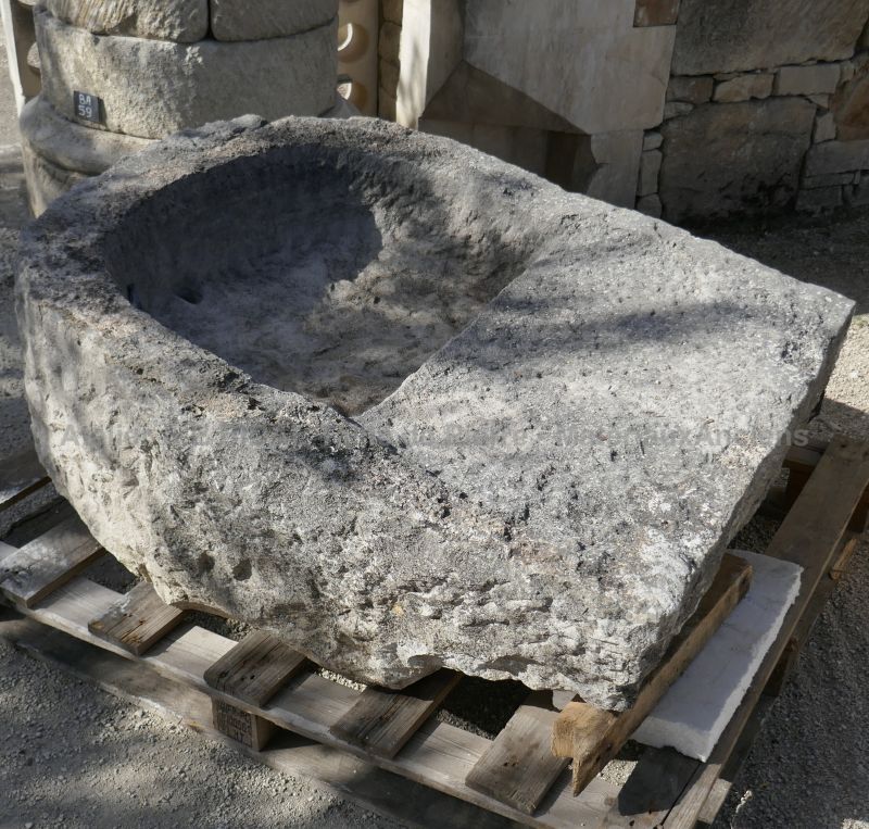 Antique former laundry sink in stone for sale at Alain BIDAL Antique Materials in Provence.