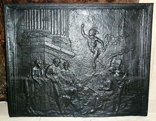 Belle plaque de cheminée en fonte - allégorie du commerce avec le Dieu romain Mercure.
