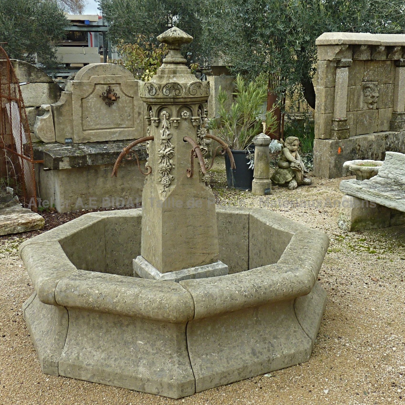Central fountain made of recalimed materials giving it a beautiful antique fountain look.