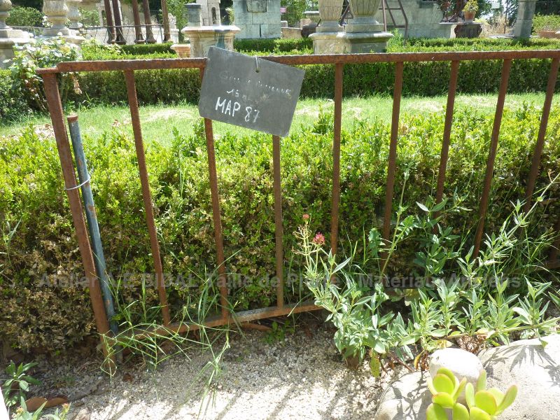 Beautiful old railing- a railing that could become a very beautiful wrought iron fence.