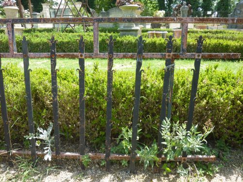 Beautiful old body guard: an original and elegant wrought iron railling.