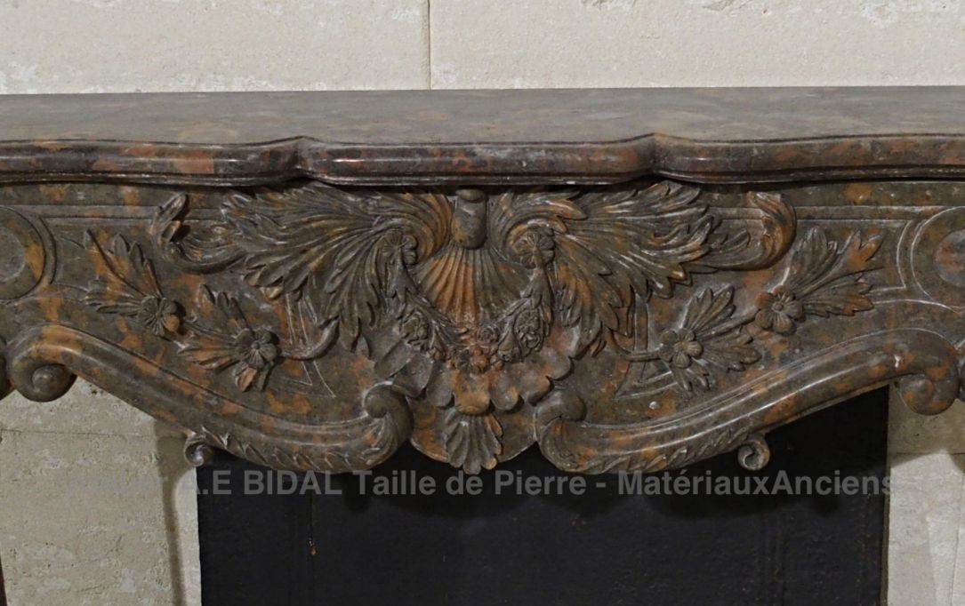 fireplace made of brown marble brown - authentic old fireplace made of high quality marble.